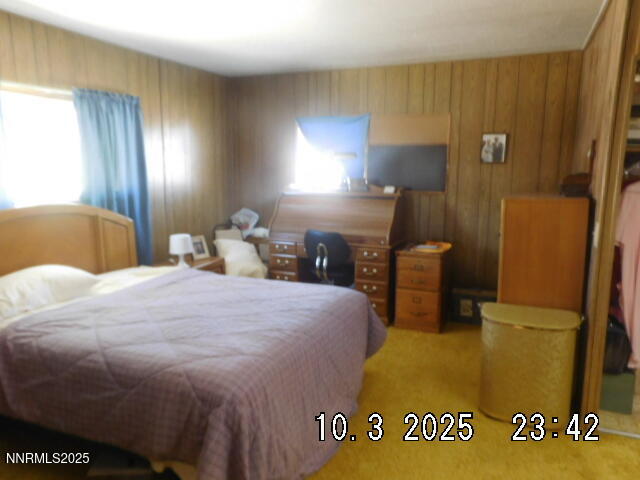 12085 Albert Way Reno, NV 89506 - Photo 10 of 14 a bedroom with a bed and wooden floor