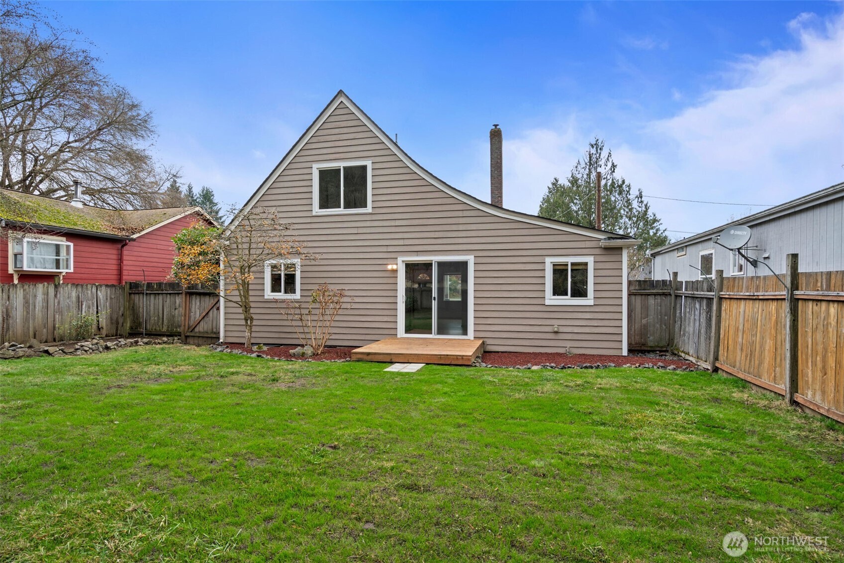 600 South Diamond Street Centralia, WA 98531 - Photo 28 of 34 a front view of a house with yard and deck