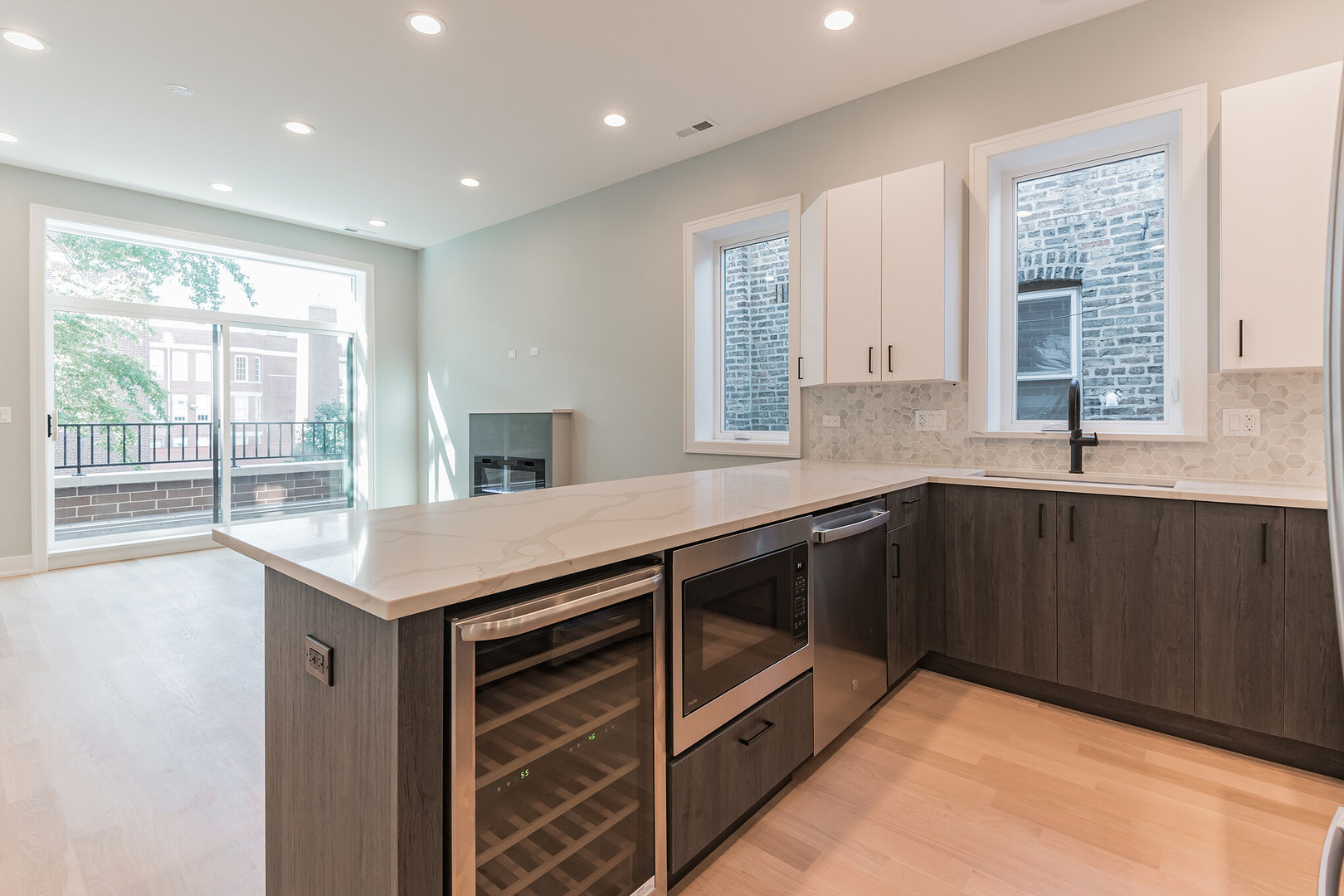 2714 West Cortez Street, Unit 3 Chicago, IL 60622 - Photo 4 of 22 a kitchen with stainless steel appliances granite countertop a sink and a cabinets