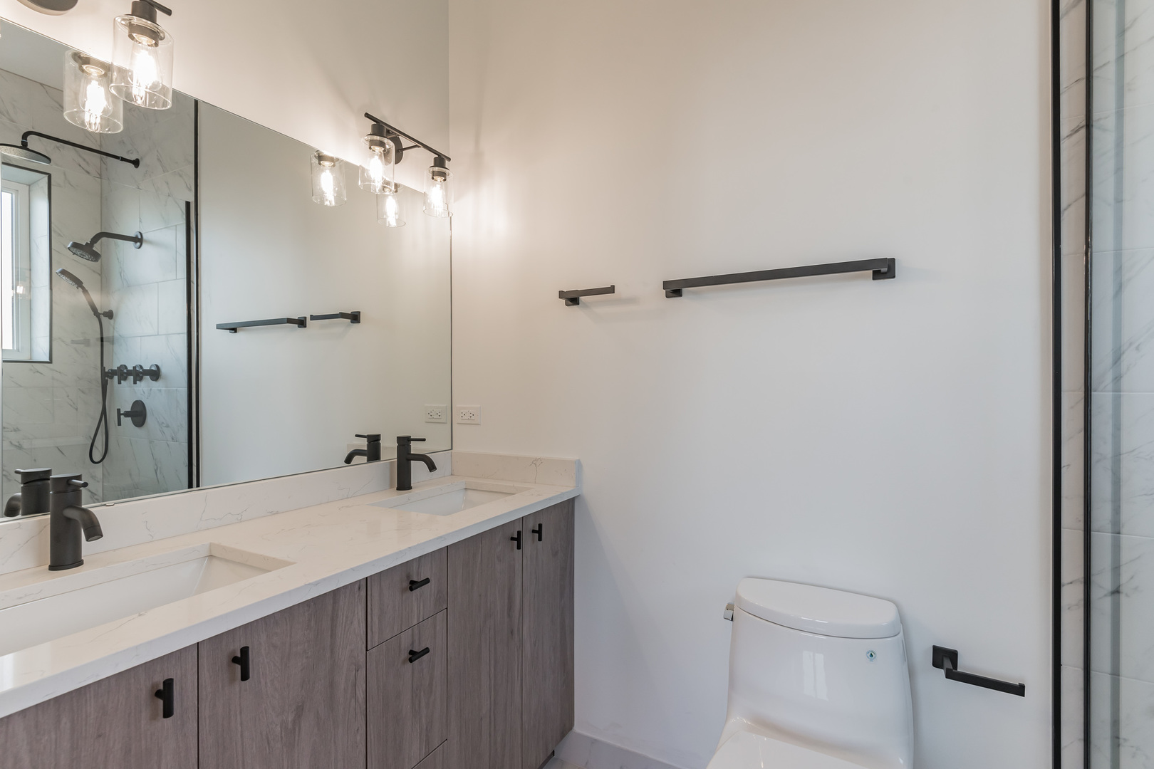 2714 West Cortez Street, Unit 3 Chicago, IL 60622 - Photo 8 of 22 a bathroom with a sink toilet and shower
