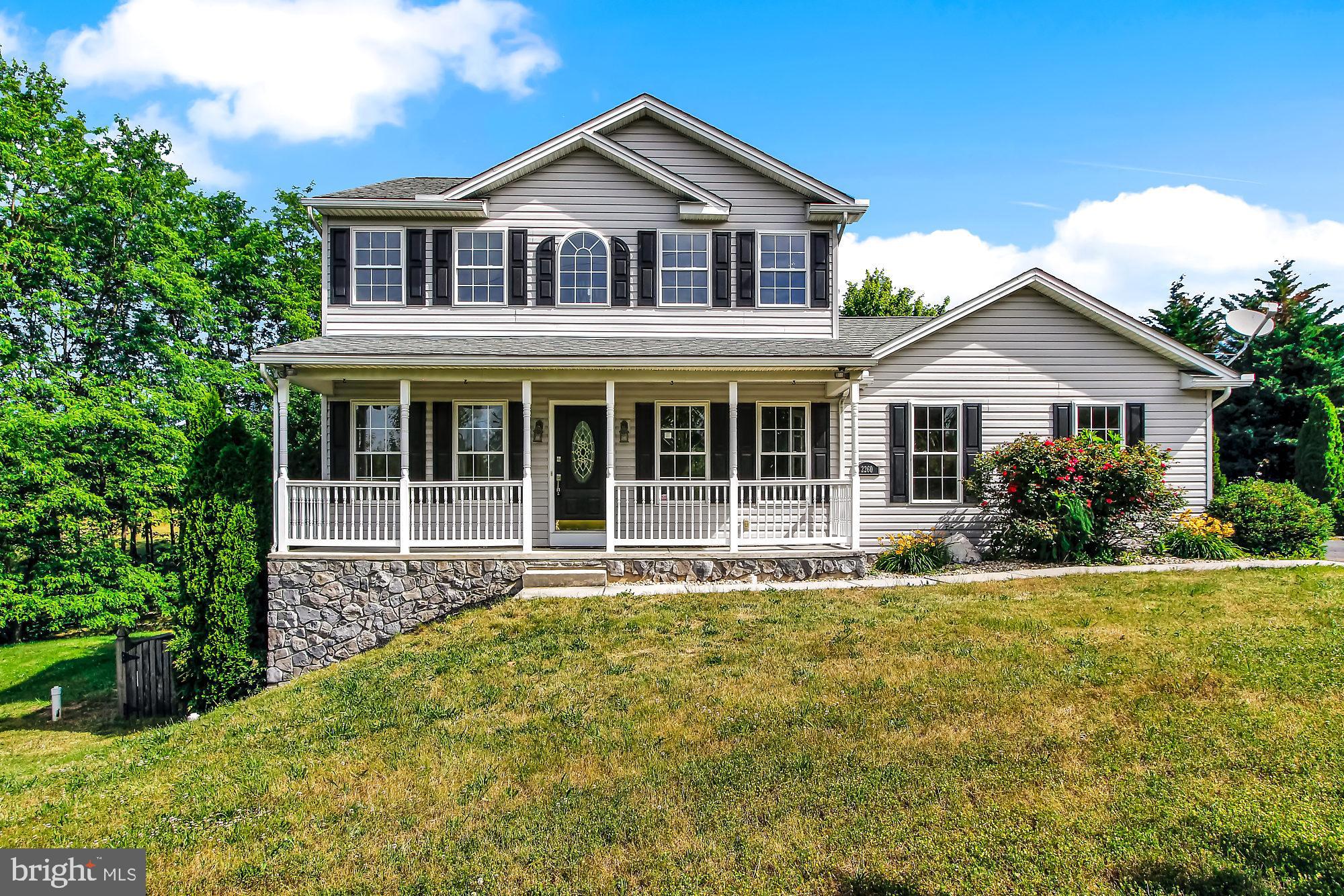 2260 Garrett Road Hanover, PA 17331 - Photo 1 of 35 a front view of a house with a yard