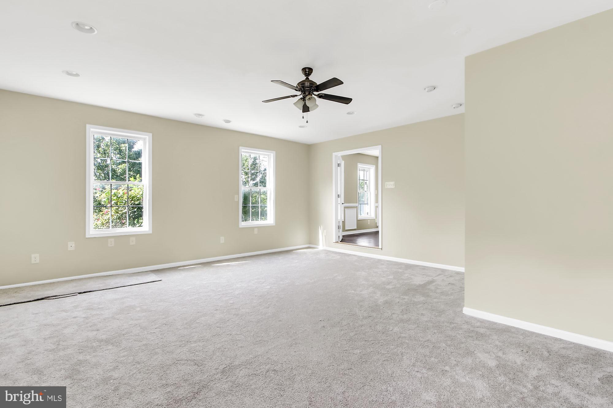 2260 Garrett Road Hanover, PA 17331 - Photo 7 of 35 a view of a livingroom with a window and a ceiling fan