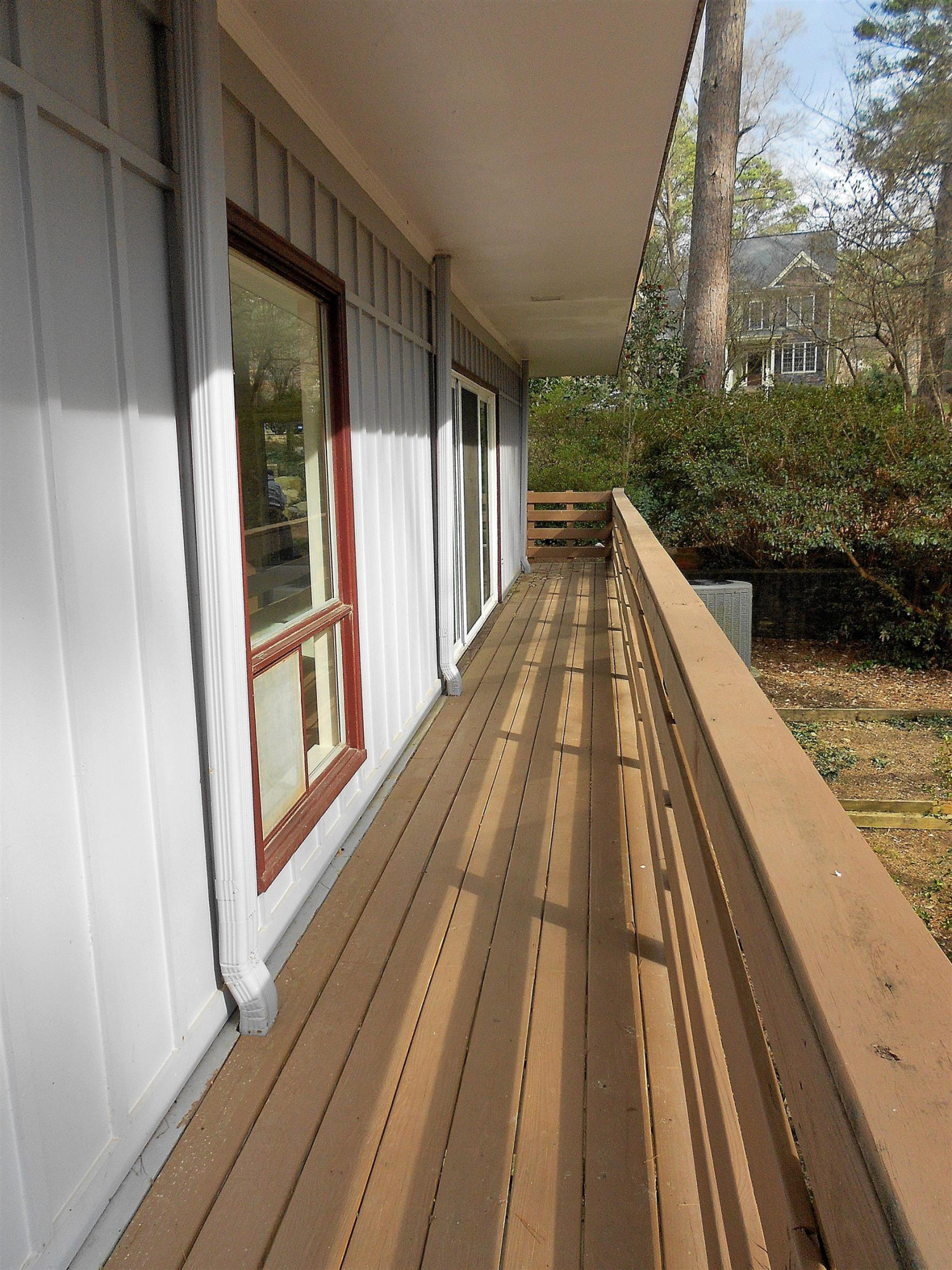 5805 Contour Drive Raleigh, NC 27612 - Photo 13 of 49 ...connects the front patio to the rear deck Catwalk