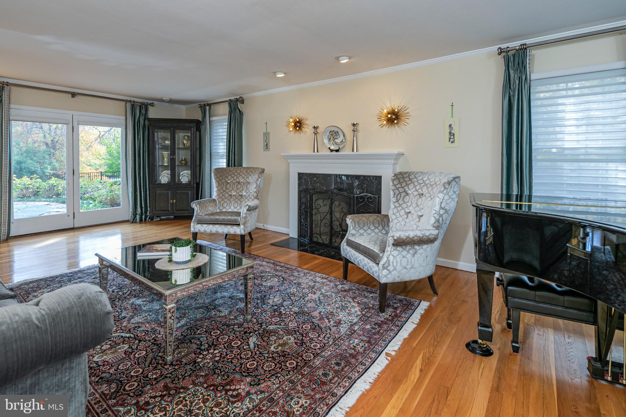 8 Winfield Road Princeton, NJ 08540 - Photo 11 of 52 a living room with furniture and a fireplace