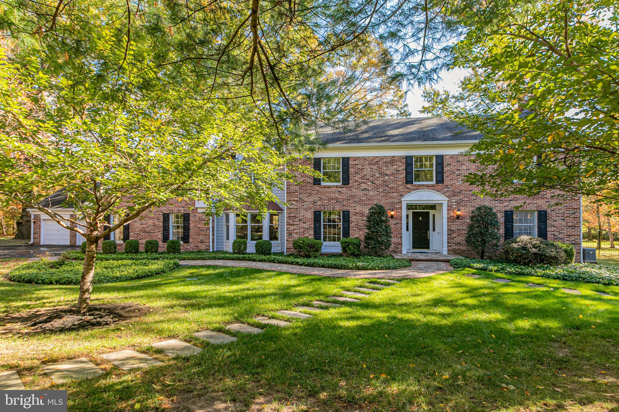 8 Winfield Road Princeton, NJ 08540 - Photo 3 of 52 a front view of a house with a garden