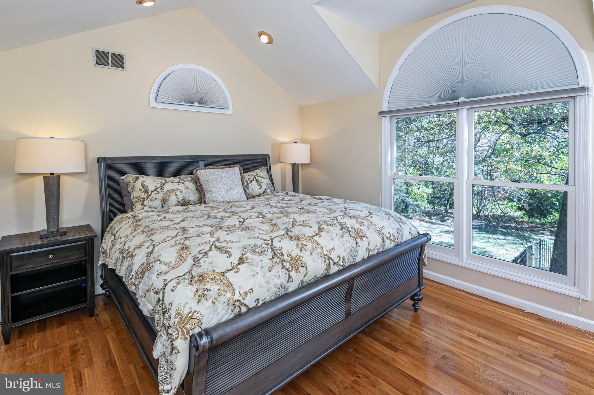 8 Winfield Road Princeton, NJ 08540 - Photo 33 of 52 a large bed sitting in a bedroom next to a window