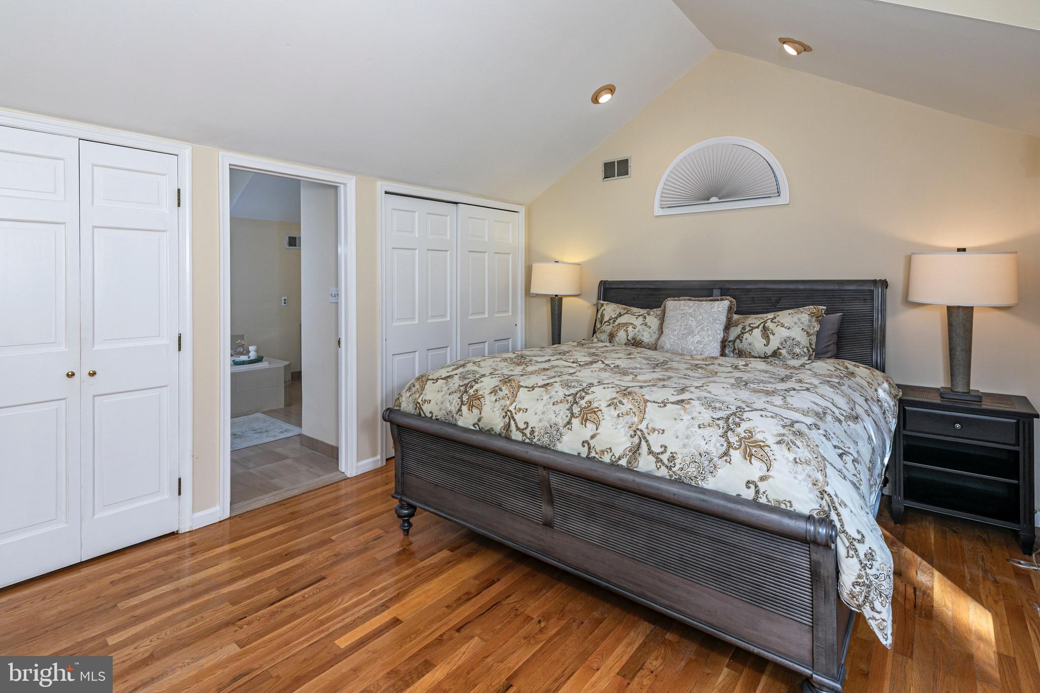 8 Winfield Road Princeton, NJ 08540 - Photo 34 of 52 a bedroom with a bed and painting on the wall