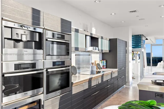 a living room with furniture and gym equipment