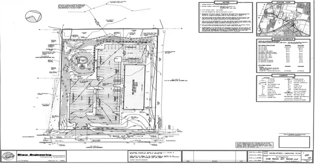 an aerial view of houses with yard