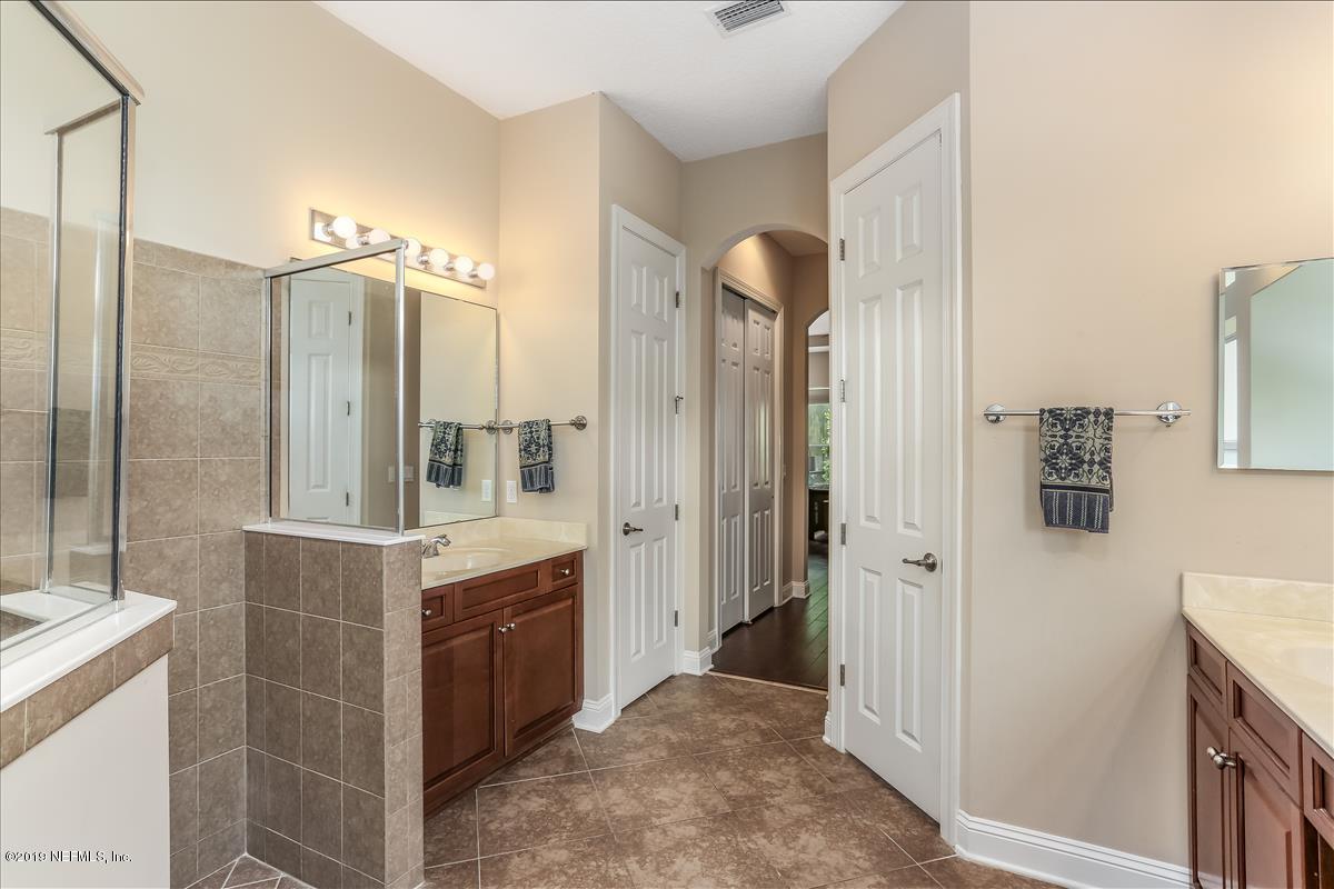 508 Sebastian Square St. Augustine, FL 32095 - Photo 27 of 46 a spacious bathroom with a shower and a sink
