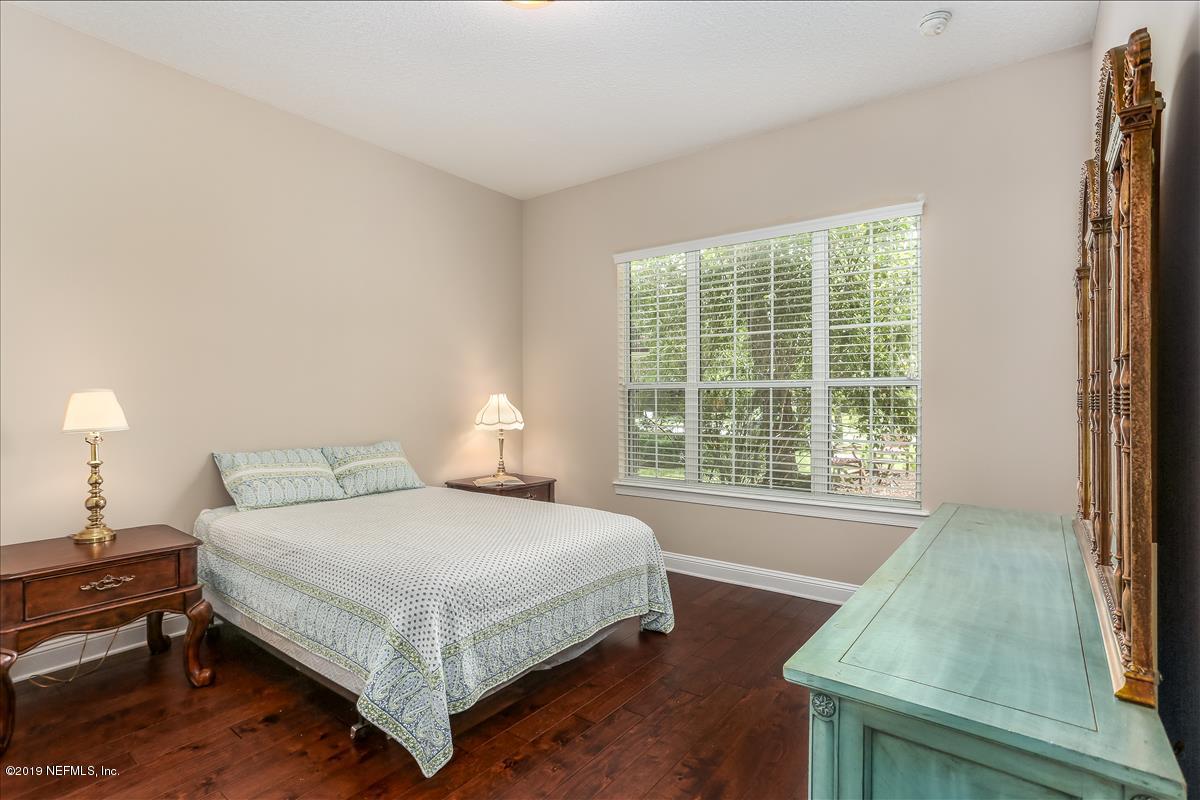 508 Sebastian Square St. Augustine, FL 32095 - Photo 28 of 46 a bedroom with a bed and window