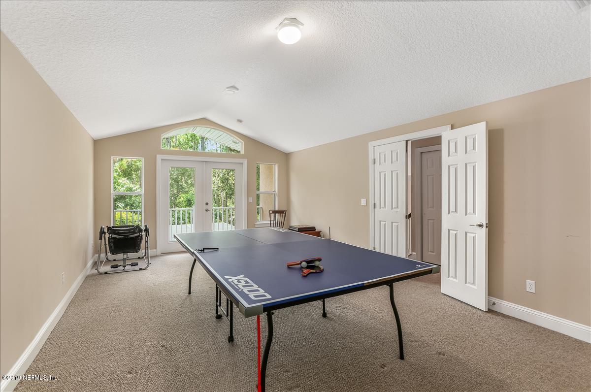 508 Sebastian Square St. Augustine, FL 32095 - Photo 36 of 46 a room with a table and windows