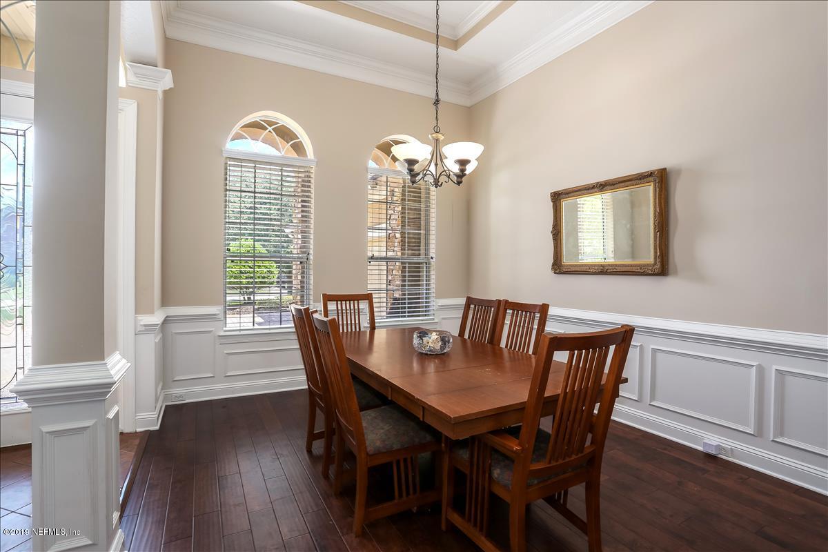 508 Sebastian Square St. Augustine, FL 32095 - Photo 5 of 46 a view of a dining room with furniture window and wooden floor