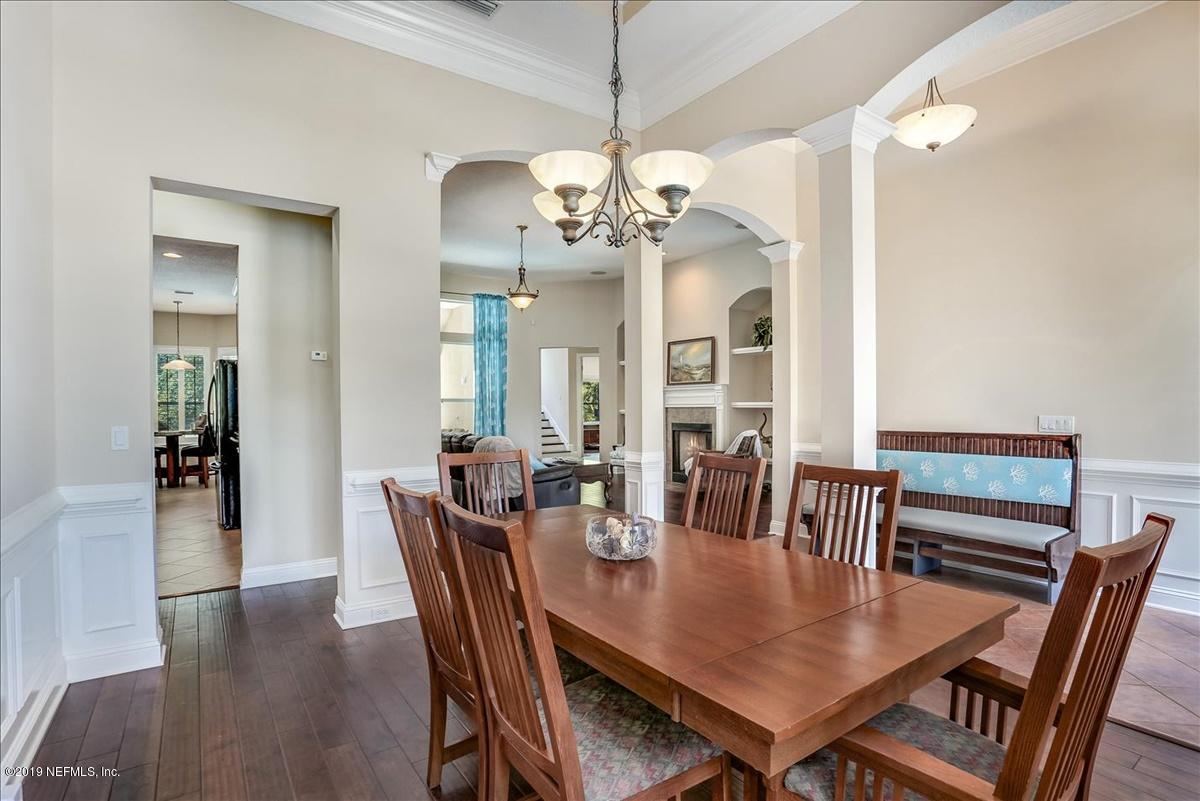 508 Sebastian Square St. Augustine, FL 32095 - Photo 6 of 46 a view of a dining room with furniture and wooden floor