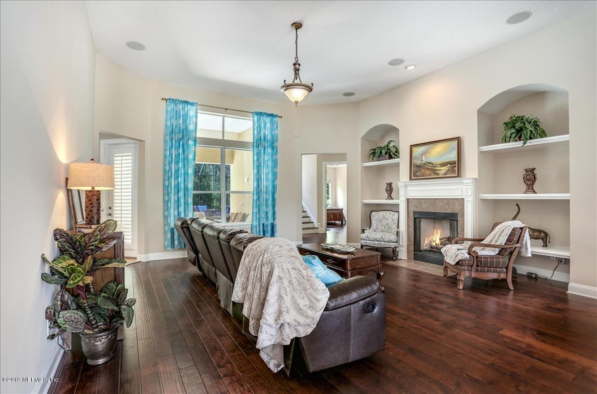 508 Sebastian Square St. Augustine, FL 32095 - Photo 7 of 46 a living room with furniture wooden floor and a chandelier