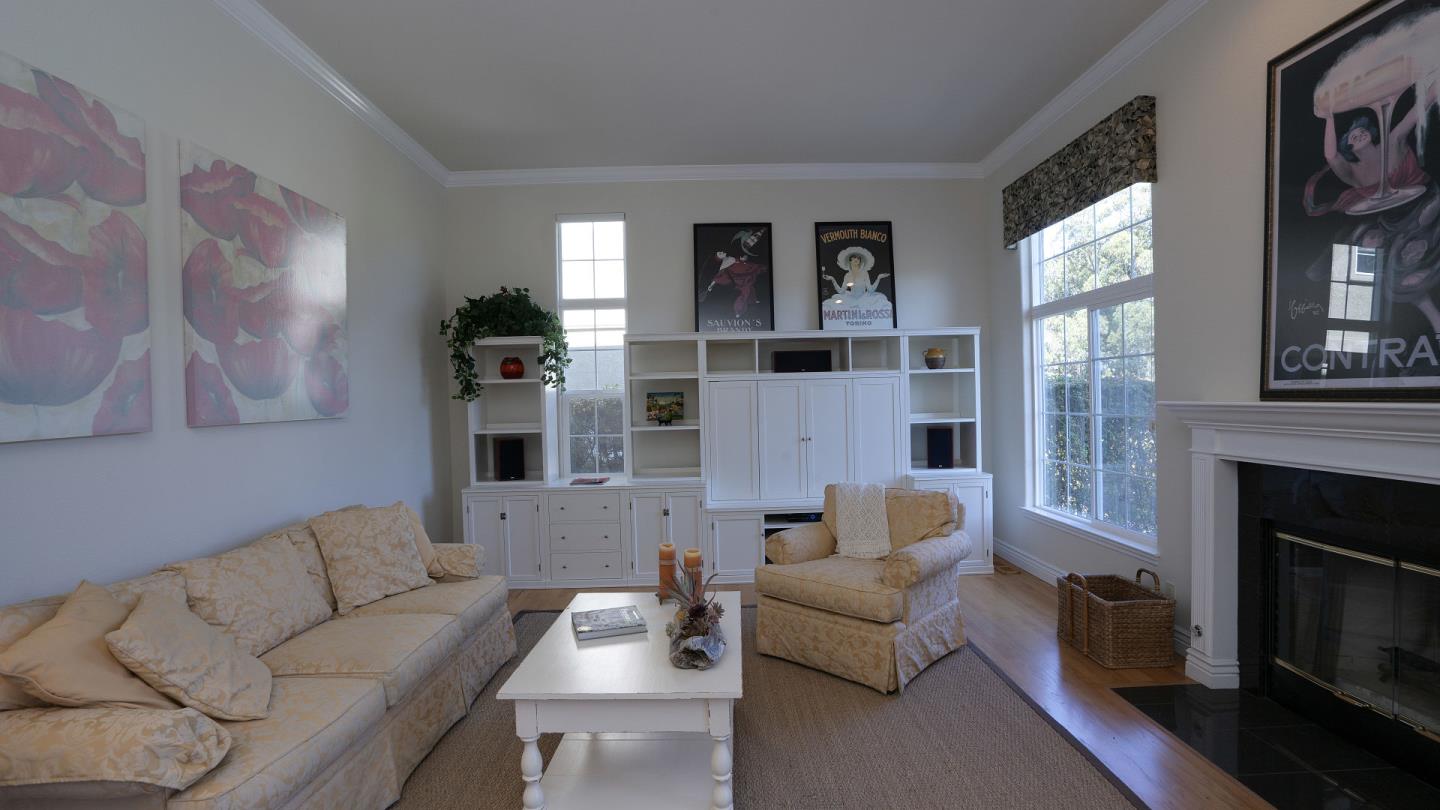 7 Turnberry Road Half Moon Bay, CA 94019 - Photo 20 of 40 a living room with furniture and a fireplace
