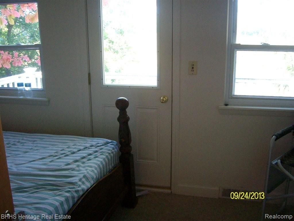 2881 East Cohoctah Road Howell, MI 48855 - Photo 16 of 16 2881 BEDROOM TO BALCONY.jpg