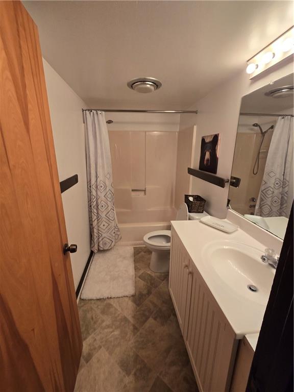 34 Sconti Ridge, Unit 405 Jasper, GA 30143 - Photo 14 of 14 a bathroom with a sink a toilet and shower