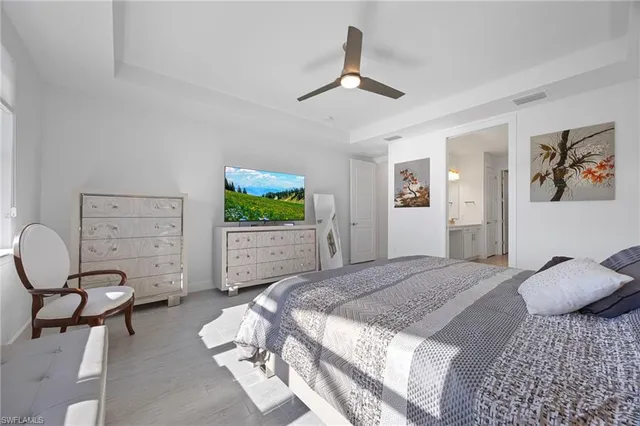 a bedroom with a bed and furniture