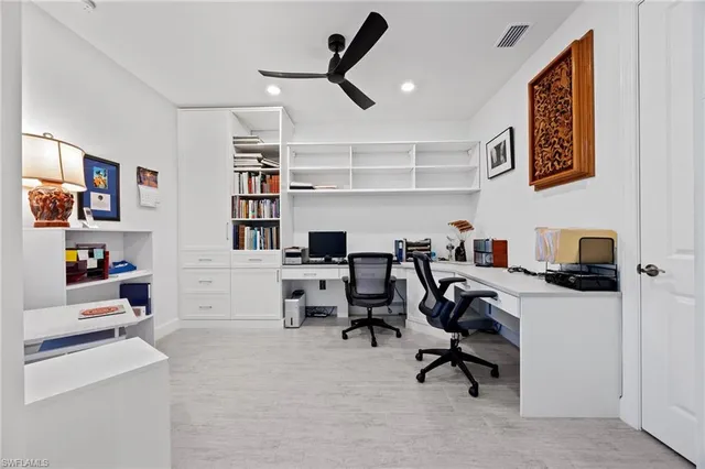 a view of a workspace with furniture and toys
