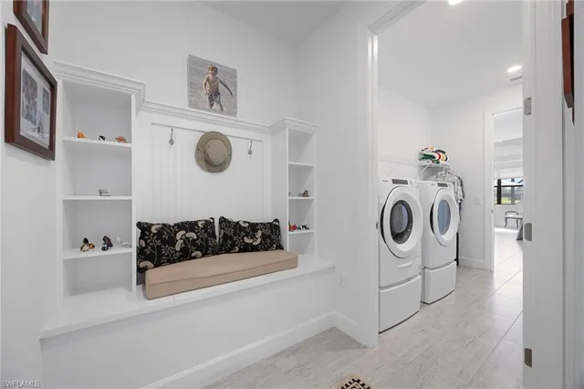 a bathroom with a sink and a washing machine