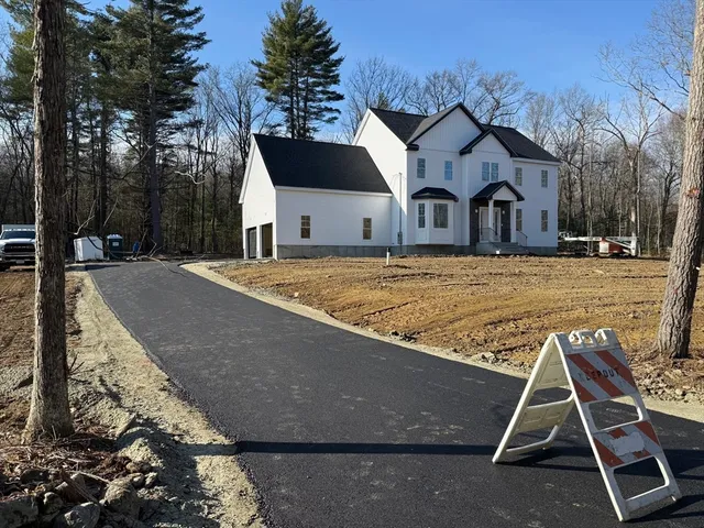 a house with yard in front of it