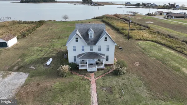 a front view of a house with lake view