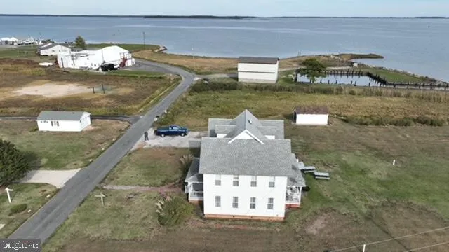 a front view of a house with lake view