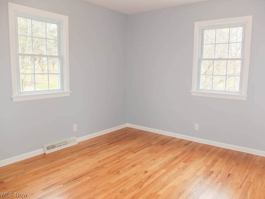 421 Holliston Road Akron, OH 44333 - Photo 13 of 22 Bedroom 3 with wood flooring.