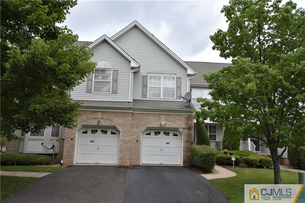 304 Hawthorne Road North Brunswick, NJ 08902 - Photo 1 of 25 a view of a house with a yard
