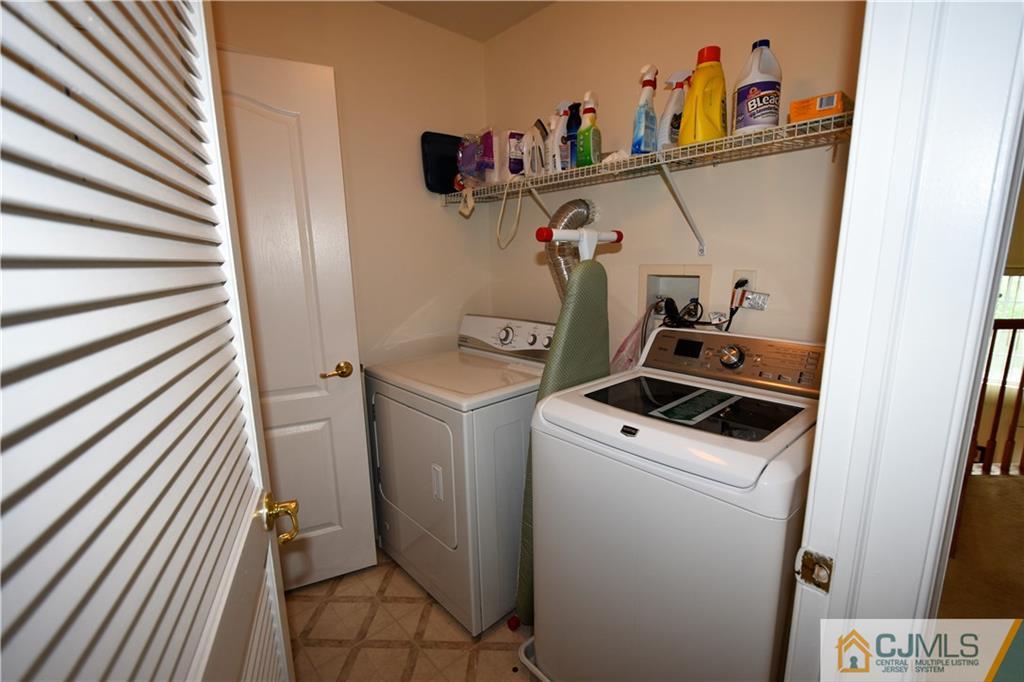 304 Hawthorne Road North Brunswick, NJ 08902 - Photo 16 of 25 a utility room with dryer and washer