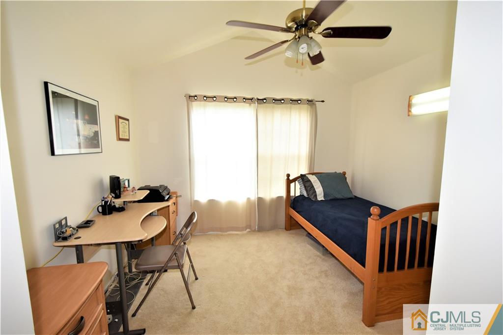 304 Hawthorne Road North Brunswick, NJ 08902 - Photo 18 of 25 a living room with furniture and a window