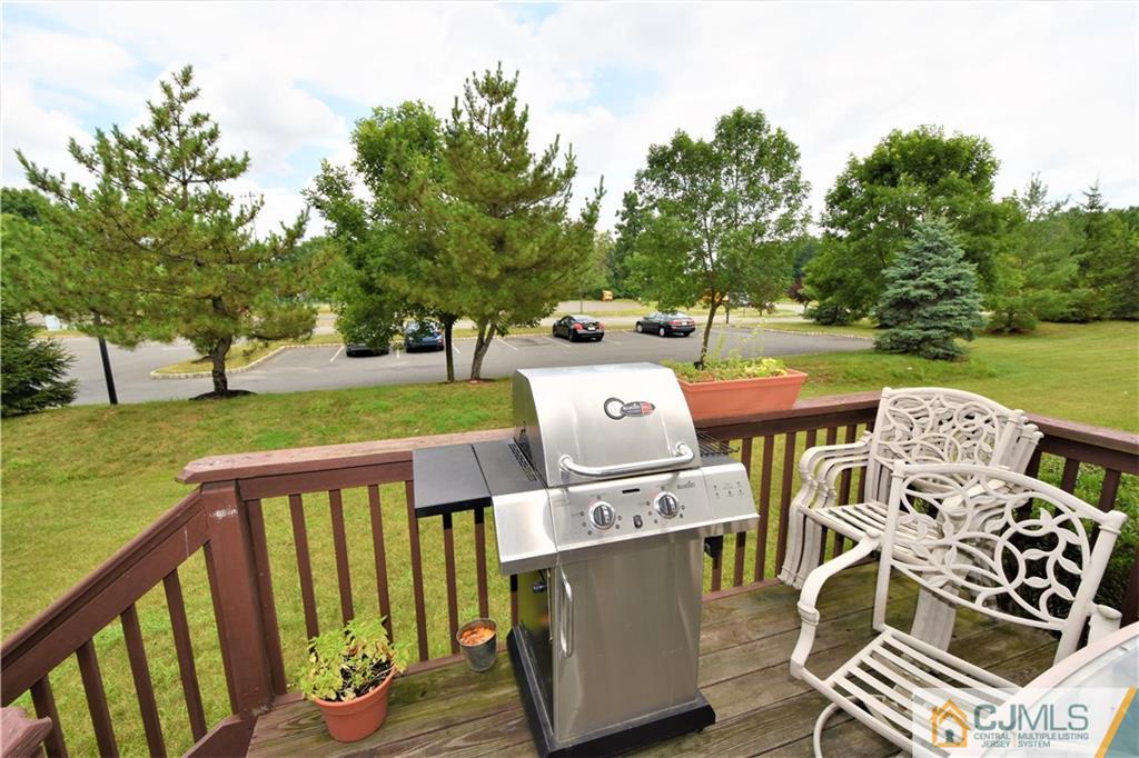 304 Hawthorne Road North Brunswick, NJ 08902 - Photo 23 of 25 a patio of a house with table and chairs