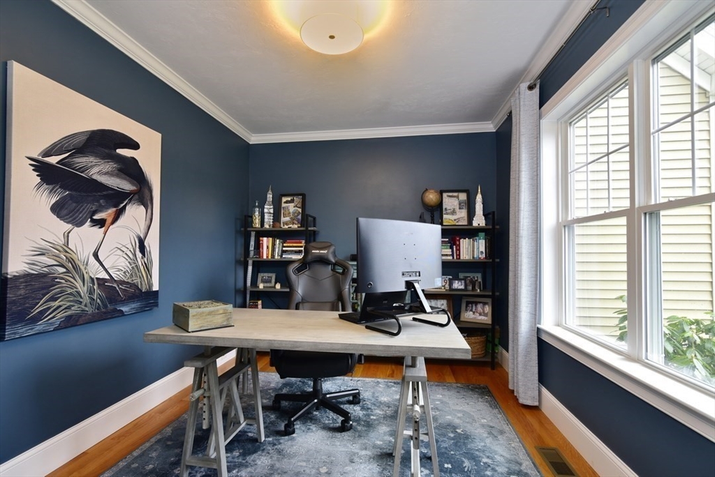 5 Tailwind Circle Norfolk, MA 02056 - Photo 19 of 40 a reading room with furniture a rug and a window