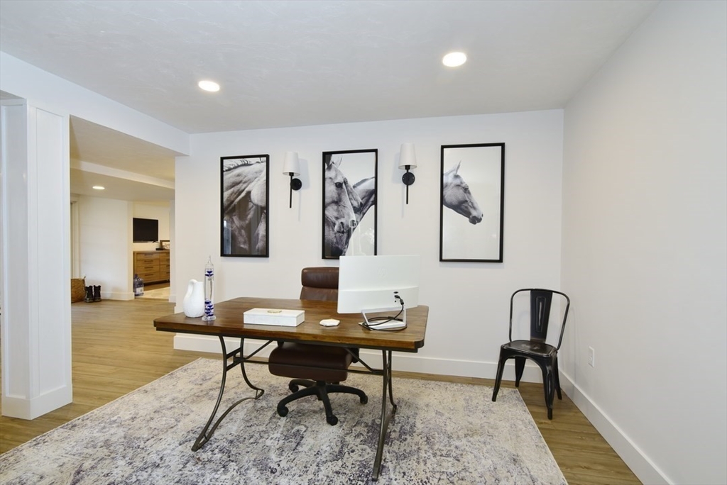 5 Tailwind Circle Norfolk, MA 02056 - Photo 29 of 40 a view of a workspace with furniture