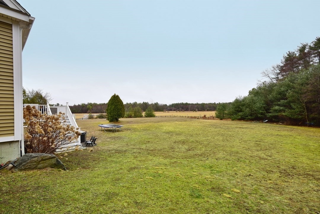 5 Tailwind Circle Norfolk, MA 02056 - Photo 36 of 40 a view of a lake with houses