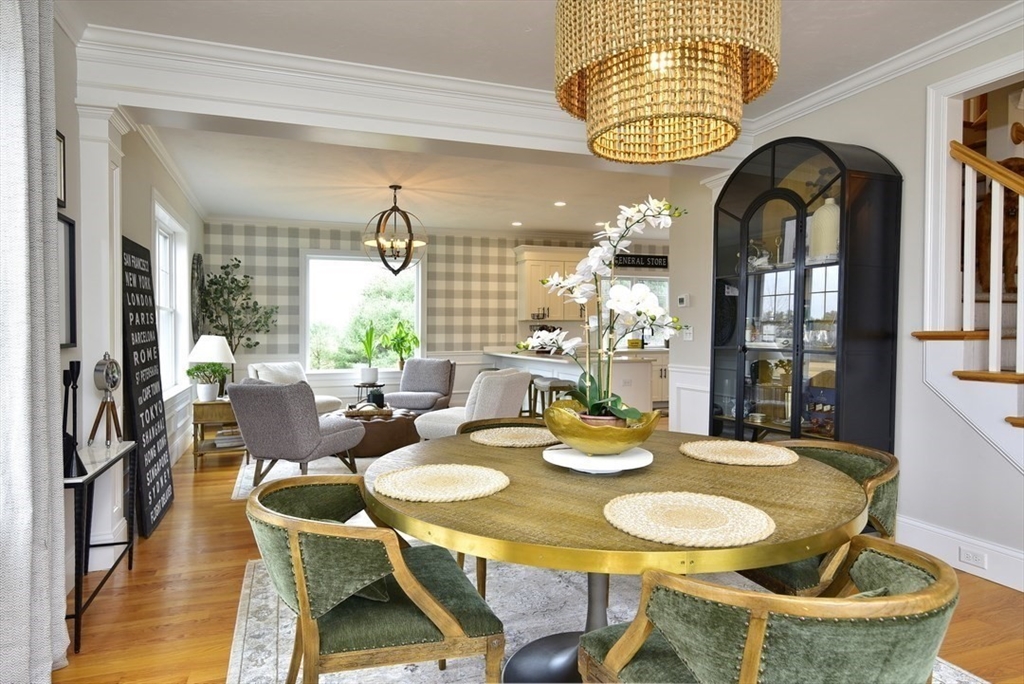 5 Tailwind Circle Norfolk, MA 02056 - Photo 5 of 40 a view of a dining room with furniture and chandelier