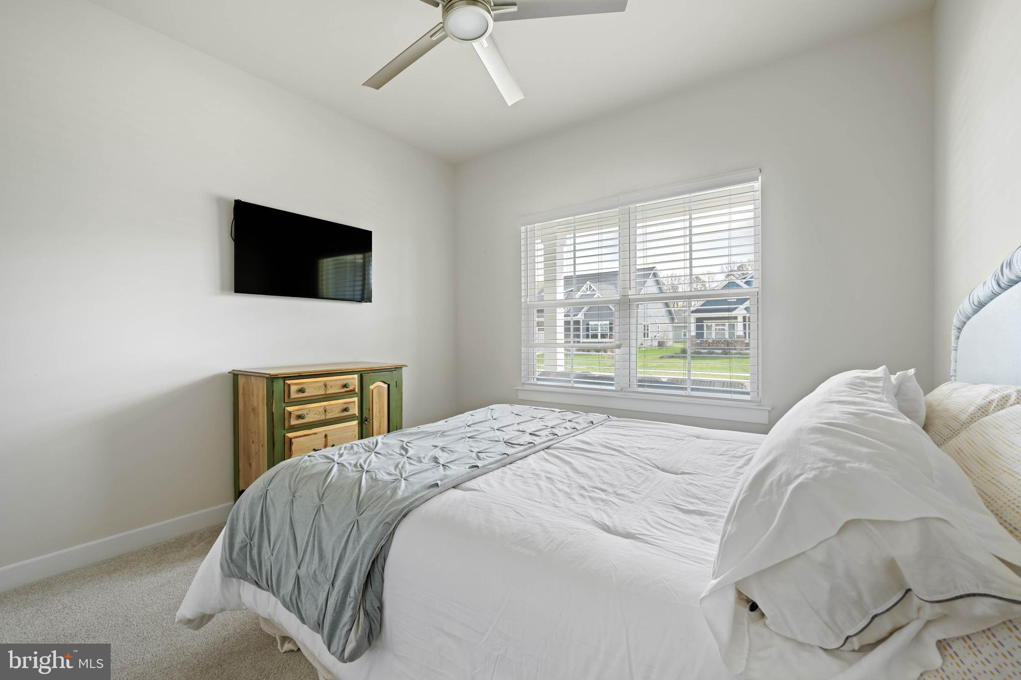 37689 Wildwood Lane Dagsboro, DE 19939 - Photo 25 of 43 a bedroom with a bed and a television