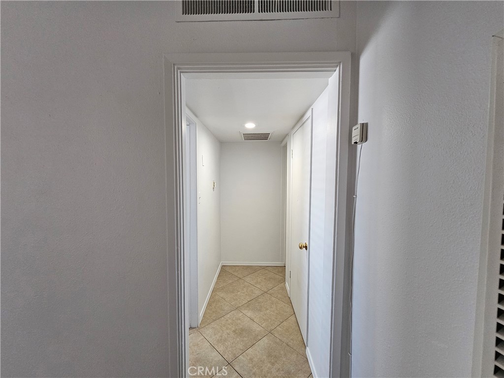 66051 3rd Street, Unit A Desert Hot Springs, CA 92240 - Photo 7 of 14 a view of a hallway