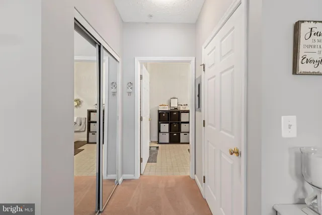 a en suite bathroom with double vanity and a mirror