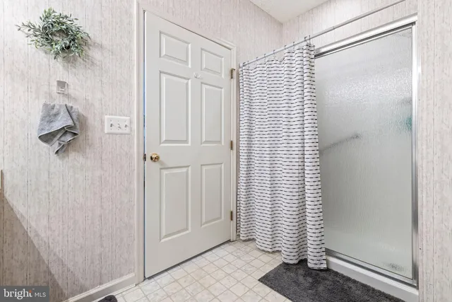 a view of a chair and table in the balcony