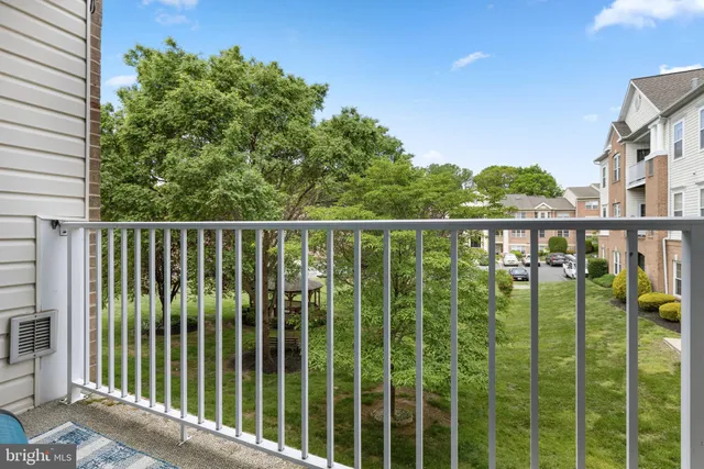a hallway with a stove top oven
