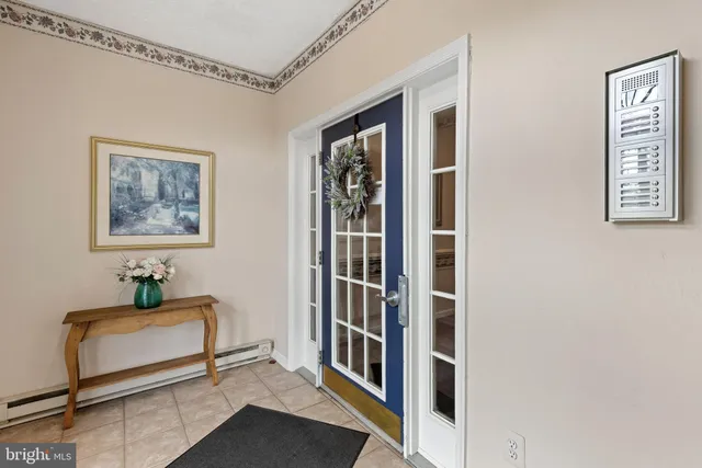 a view of a park with bench and trees