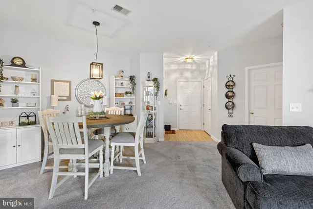 a view of a livingroom and dining room
