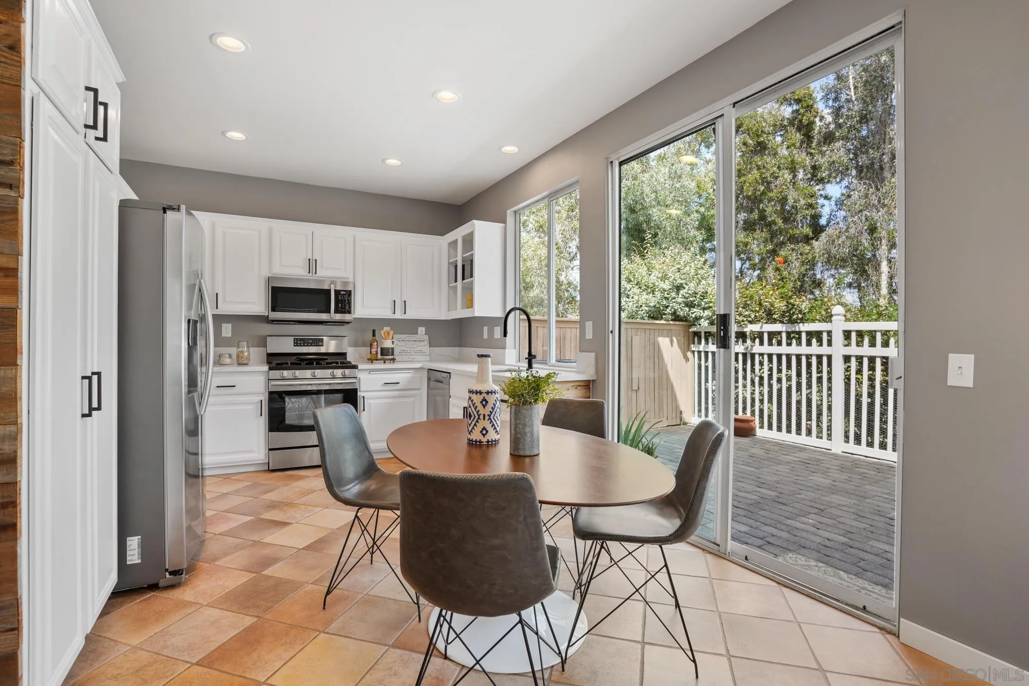 1137 Pacifica Place Encinitas, CA 92024 - Photo 12 of 31 a view of a dining room with furniture window and outside view