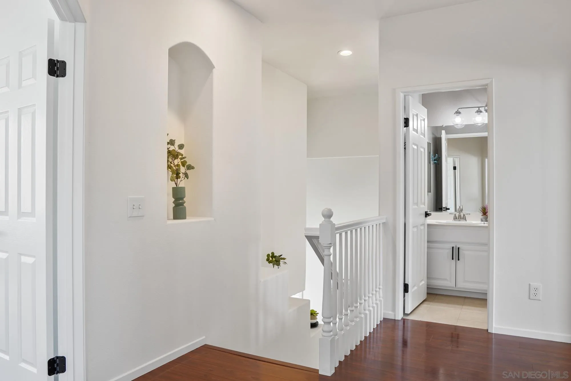 1137 Pacifica Place Encinitas, CA 92024 - Photo 16 of 31 a view of an entryway with wooden floor