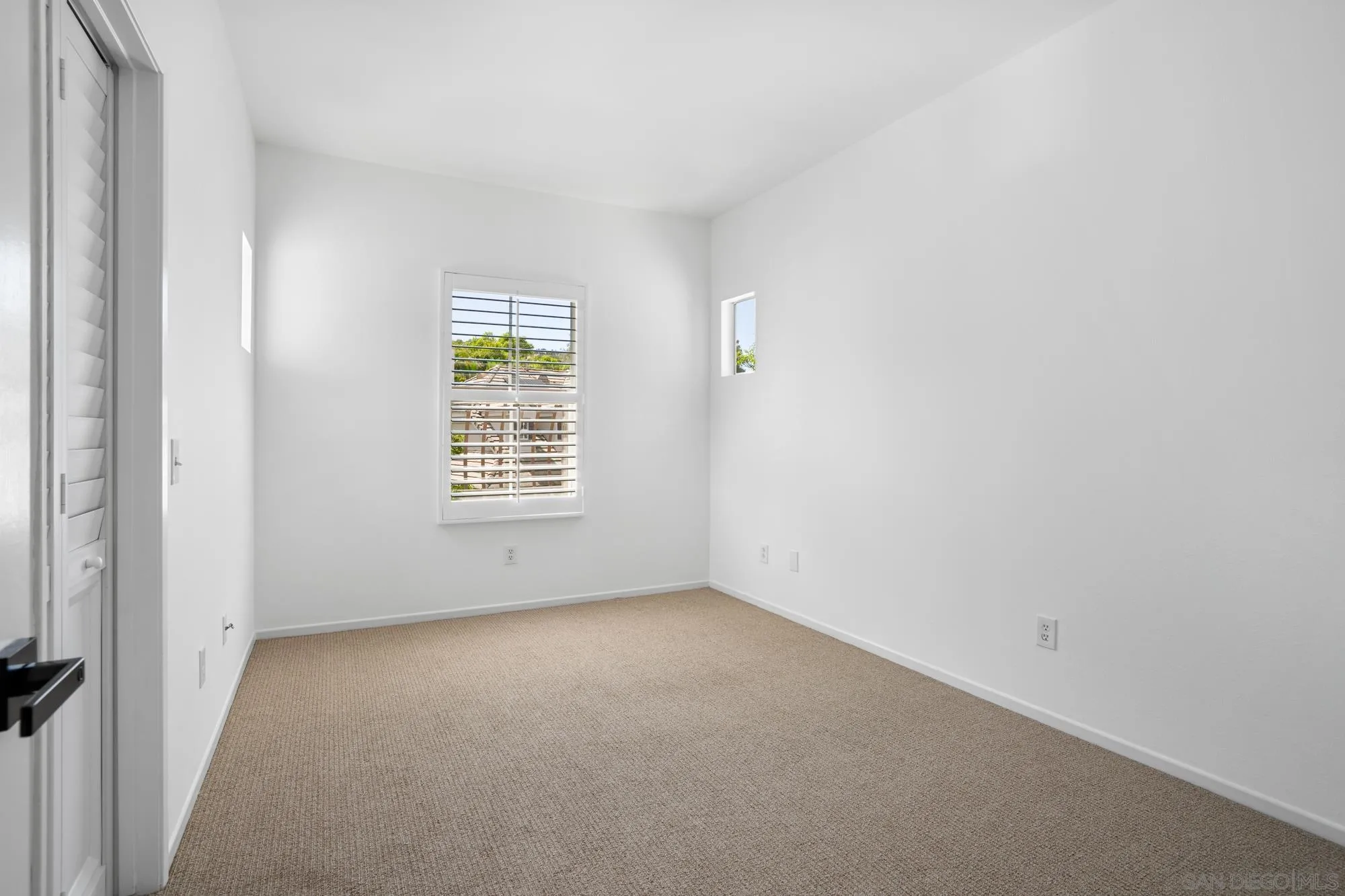 1137 Pacifica Place Encinitas, CA 92024 - Photo 18 of 31 a view of an empty room with a window