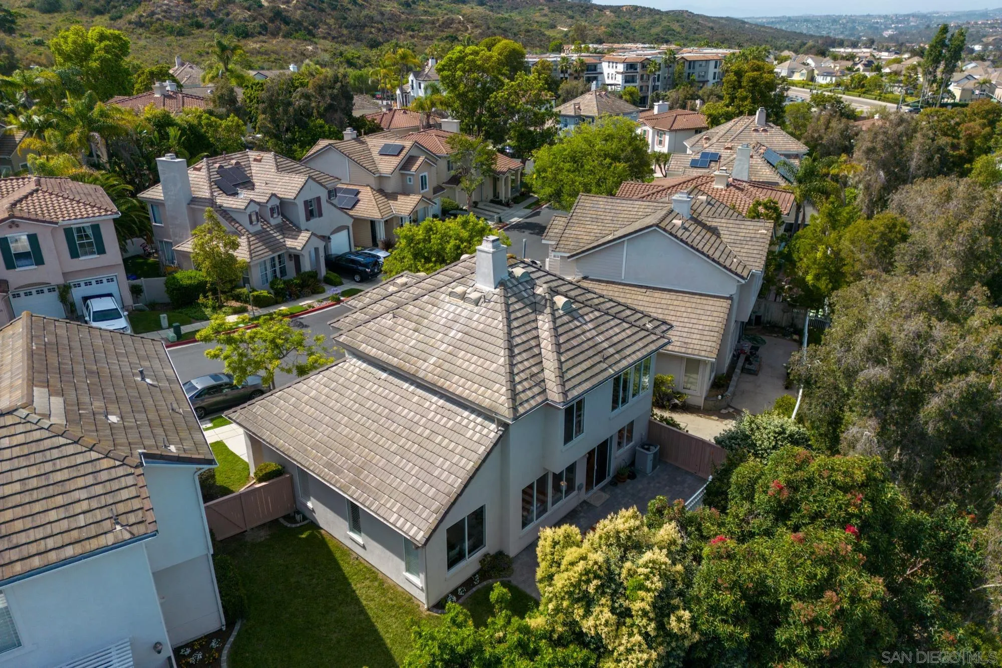 1137 Pacifica Place Encinitas, CA 92024 - Photo 30 of 31 an aerial view of a house with a garden