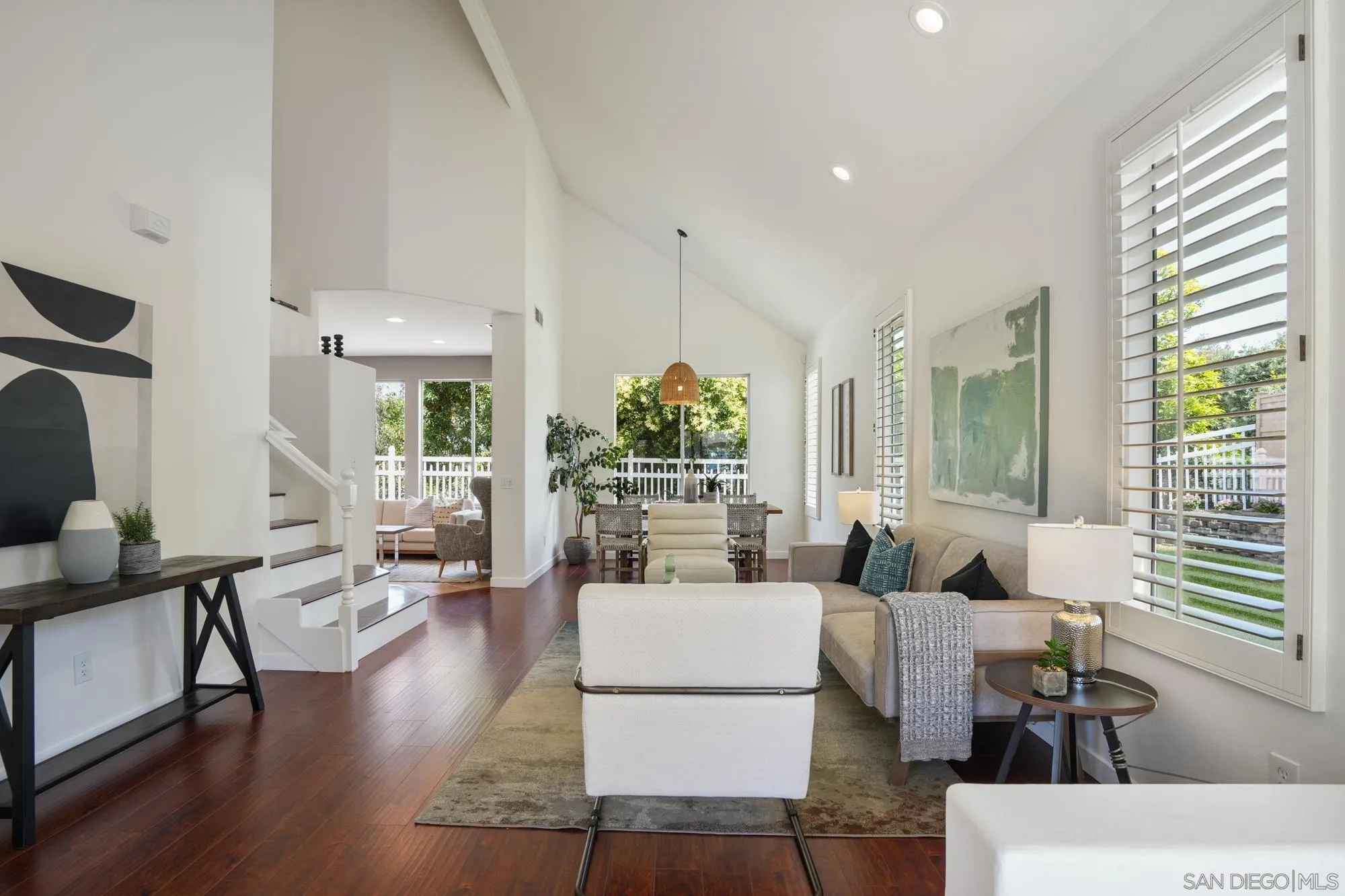1137 Pacifica Place Encinitas, CA 92024 - Photo 4 of 31 a living room with furniture and a large window