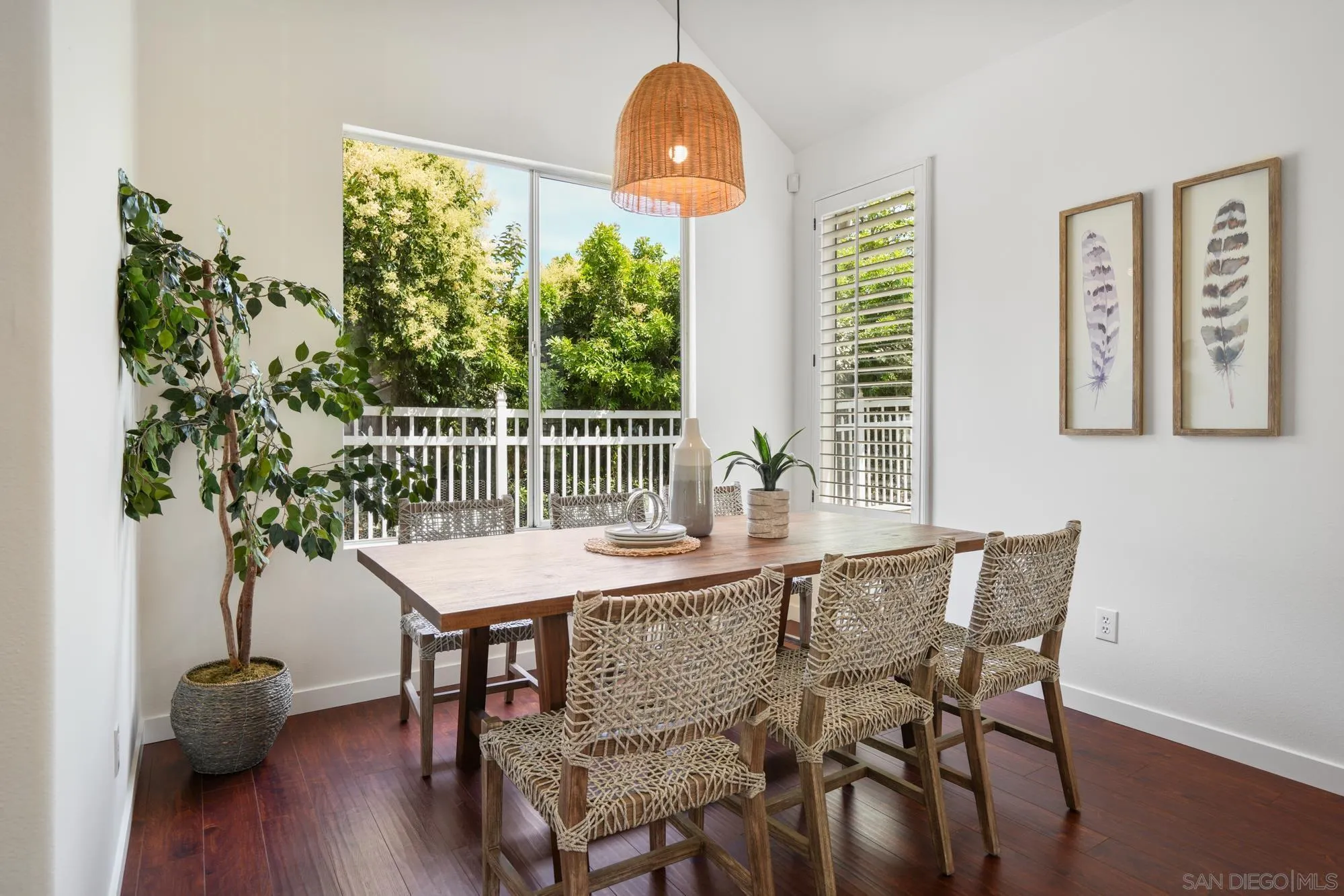 1137 Pacifica Place Encinitas, CA 92024 - Photo 8 of 31 a dining room with furniture and wooden floor